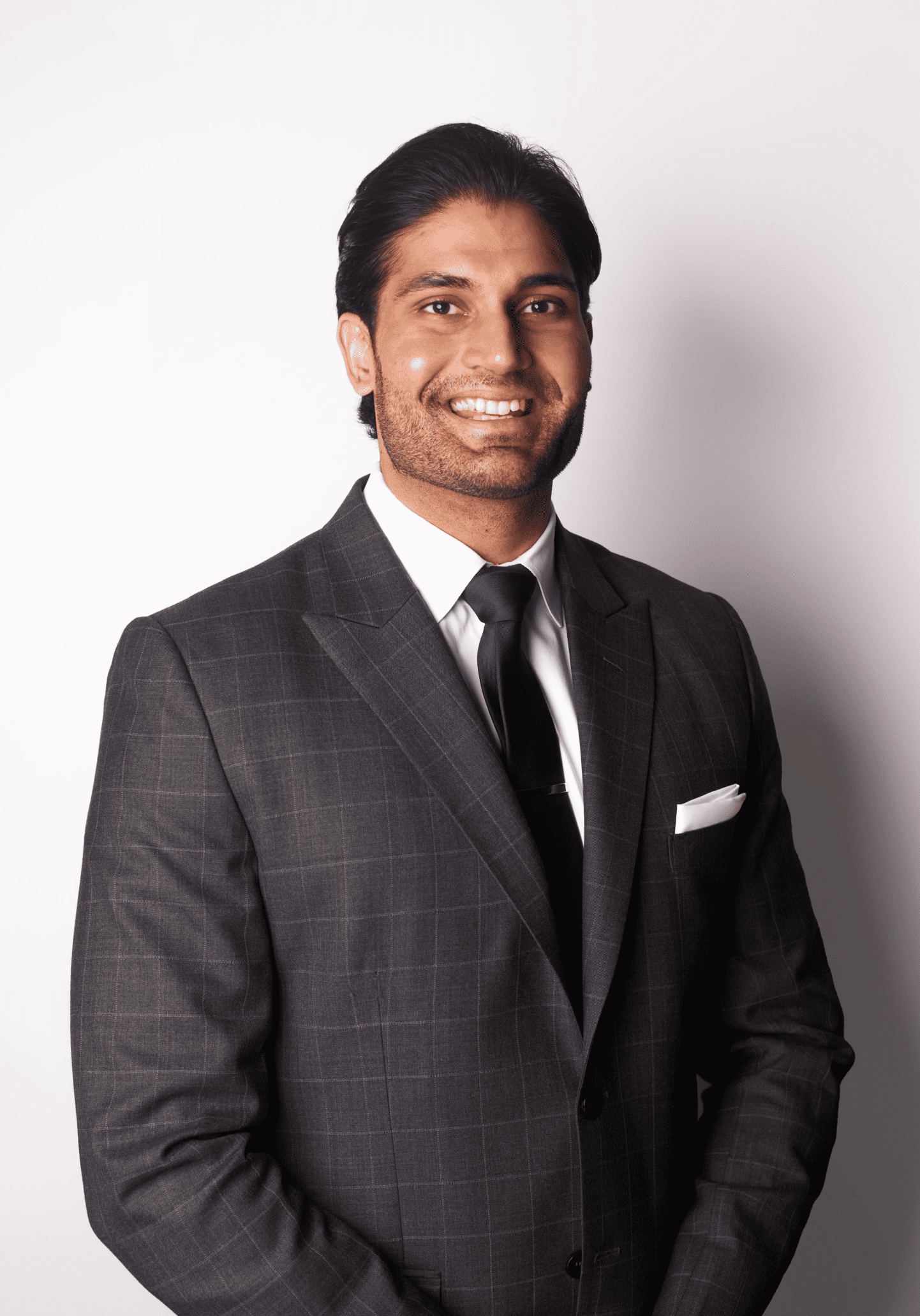 Iman Romana who is a criminal lawyer at grewal litigation posing for a headshot at their office in surrey, B.C